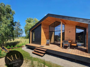 Werder Chalet -- GROßES SONNENDECK -- Strand 150m I Sauna I eKamin I bis 8 Pers I Meerblick I by 